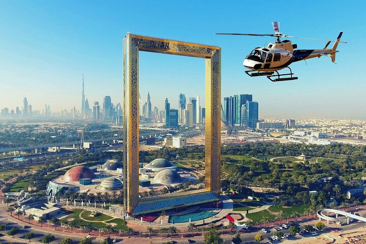 Experience Dubai's skyline from above witnessing iconic landmarks like the Burj Khalifa and the Dubai Frame revealing the city's unique blend of modernity and tradition. Aerial views await!